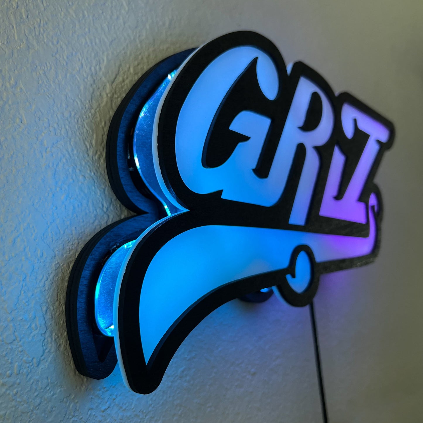 Left side view facing the lamp, showing part of the LED strip which is behind the plexiglass & wood GRiZ logo.